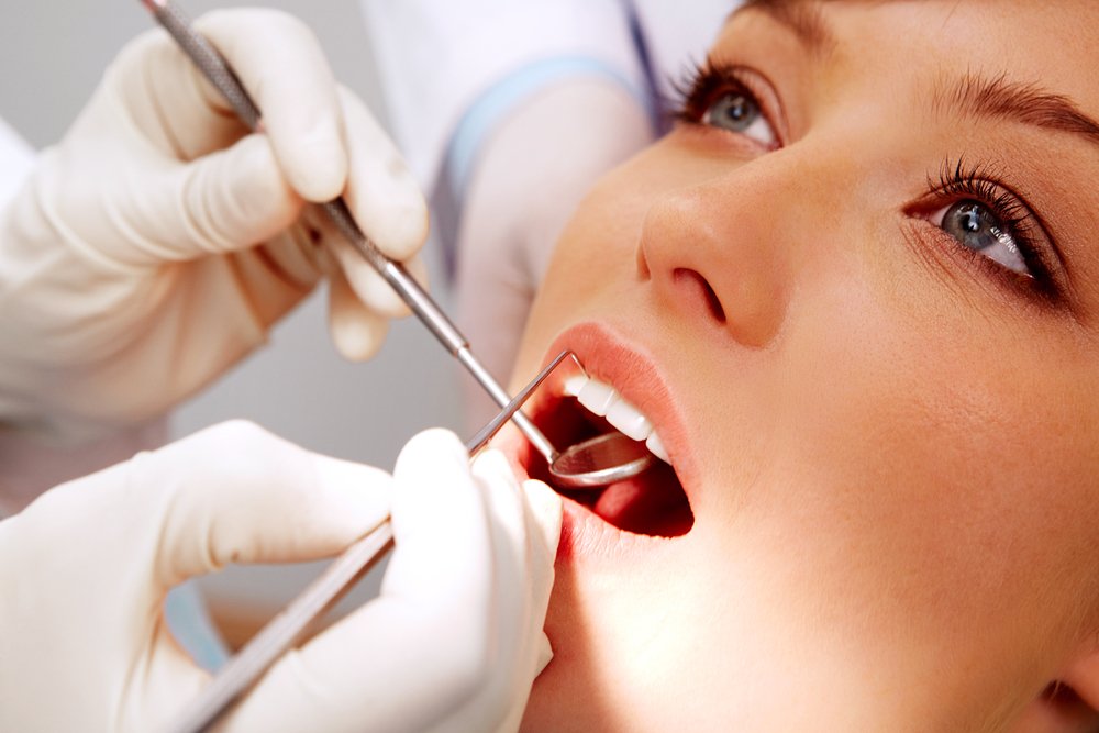 Close up,Of,Female,Patient,Having,Her,Teeth,Examined,By,Specialist