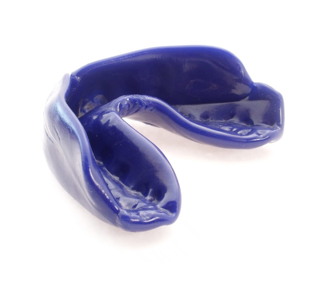 One,Blue,Mouthguard,Isolated,On,White,Background
